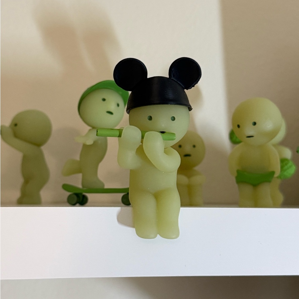 Green Figurine with Black Ears